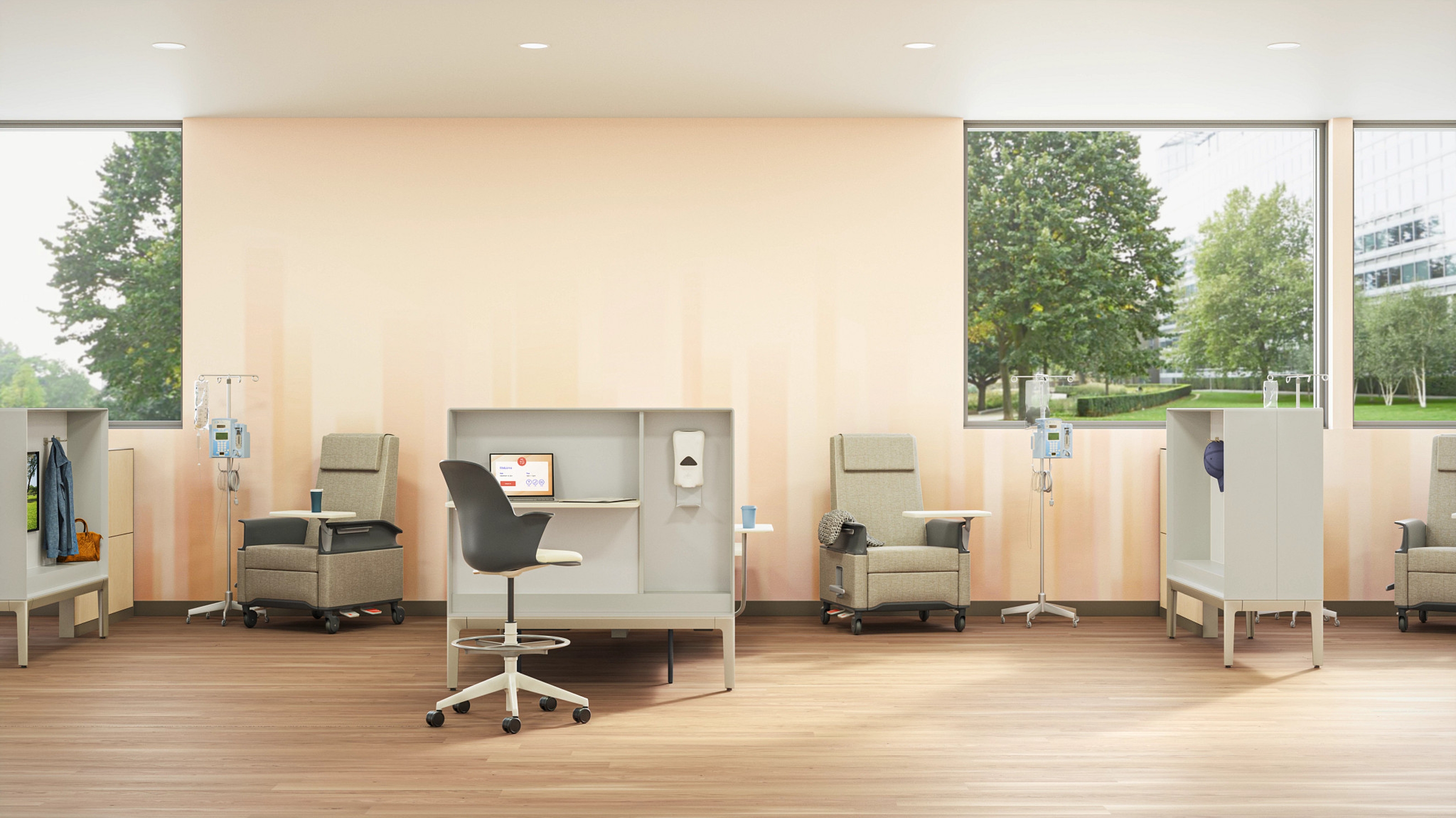 Medical exam space equipped with gray Node stools, beige Empath chairs and IV medicine.
