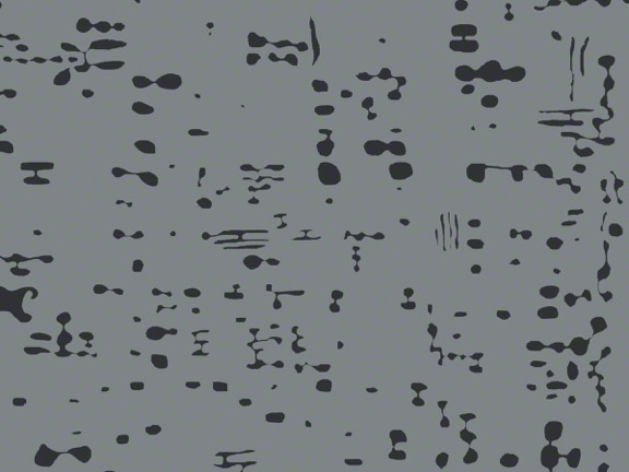 A gray and black speckled rug from ARZU