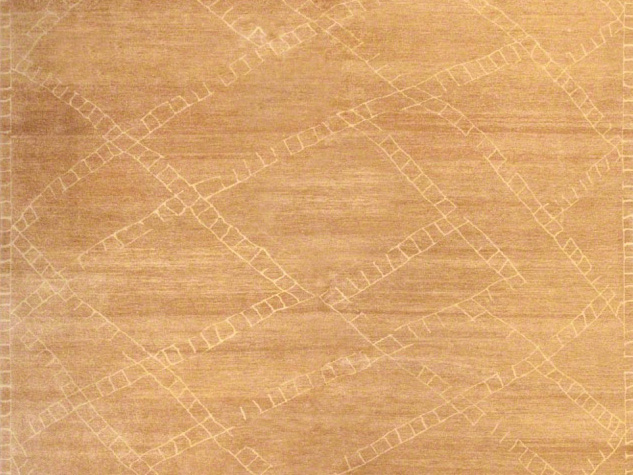 Gold tone rug with diamond like pattern from ARZU