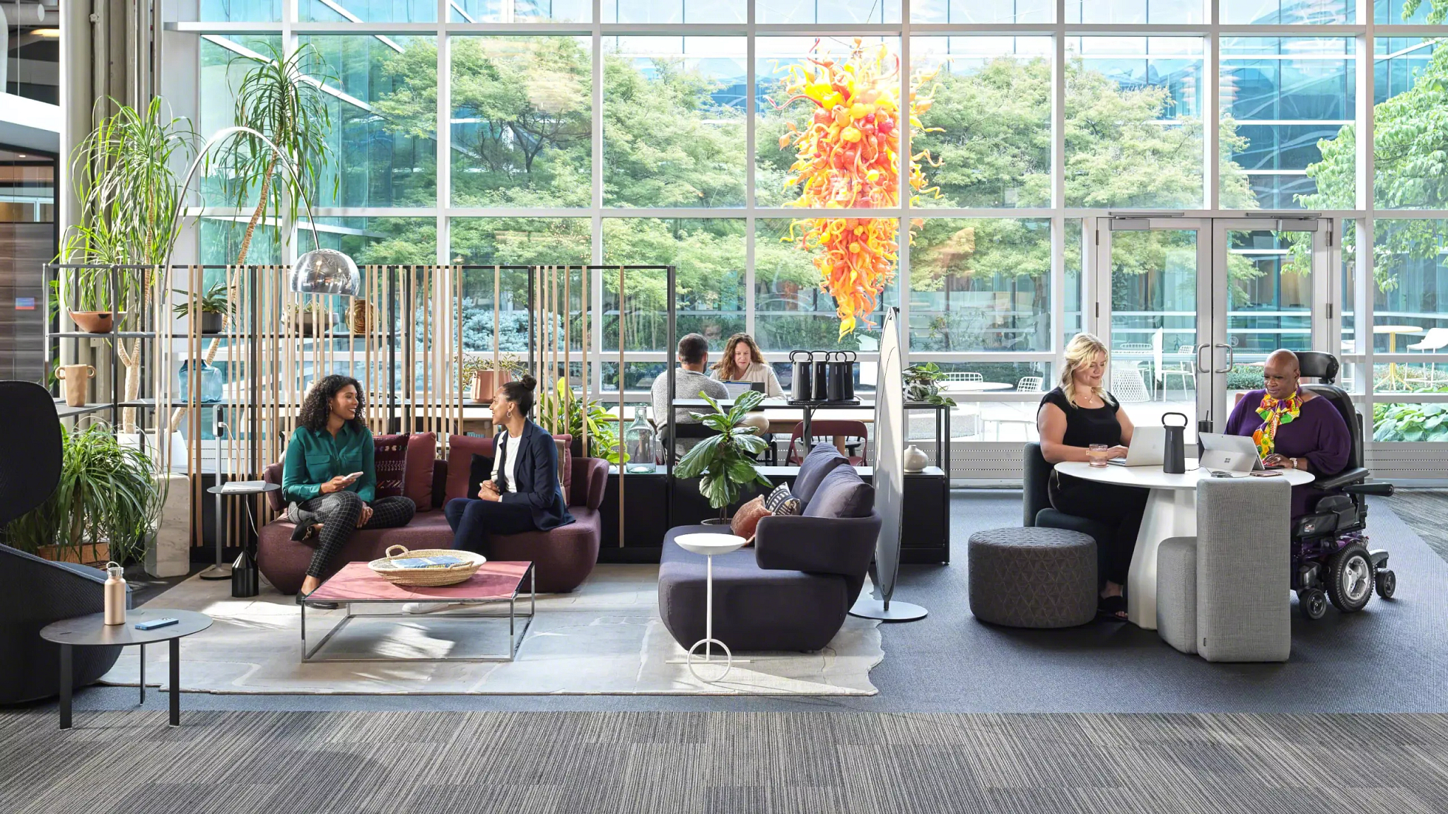 happy employees talking with each other